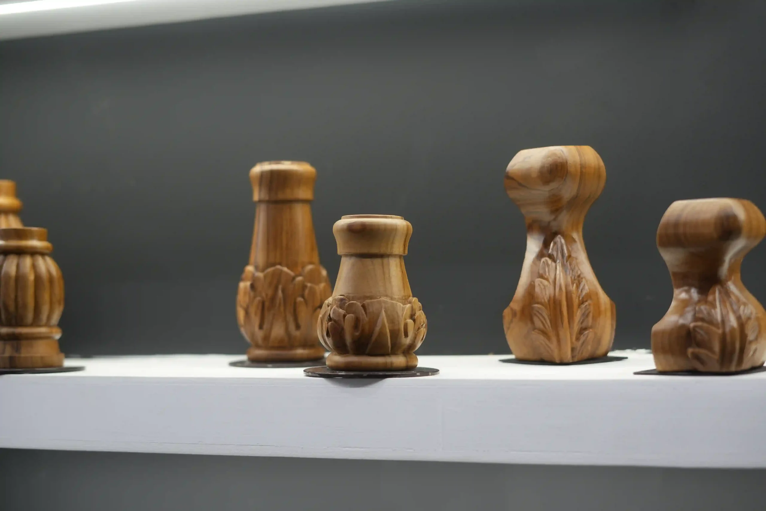 hand-carved acanthus-leaf wooden furniture legs in close-up